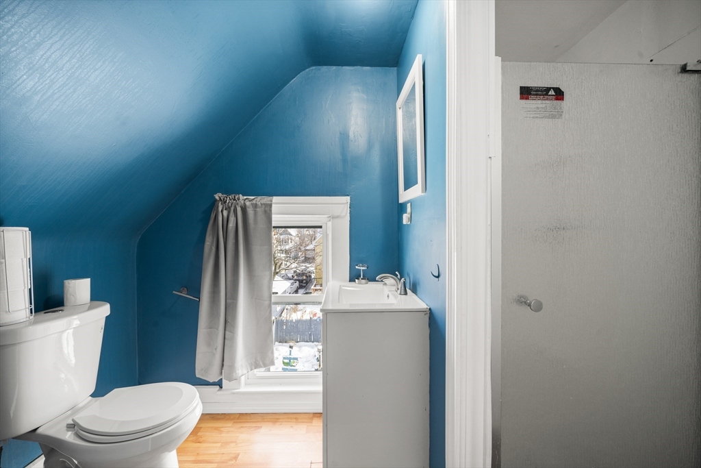 55 Malden Street Springfield, MA 01108 - Photo 32 of 40 a bathroom with a sink a toilet and shower