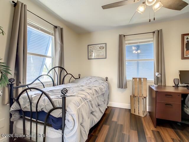 205 Rita Boulevard Melbourne Beach, FL 32951 - Photo 11 of 19 a bedroom with furniture and a window