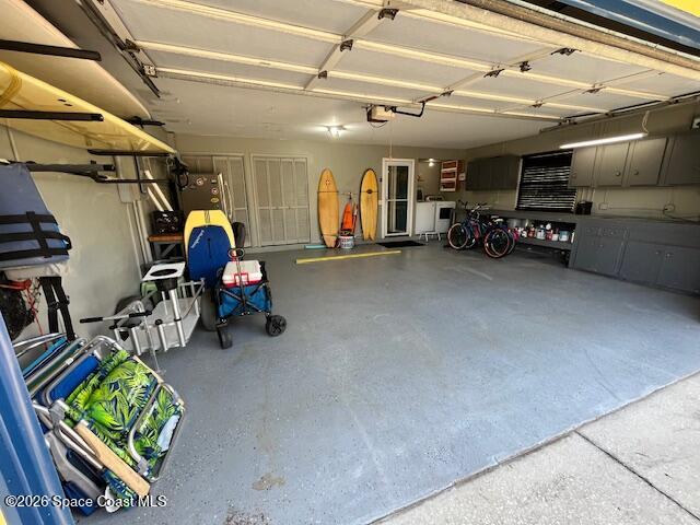 205 Rita Boulevard Melbourne Beach, FL 32951 - Photo 18 of 19 a view of parking garage with cars