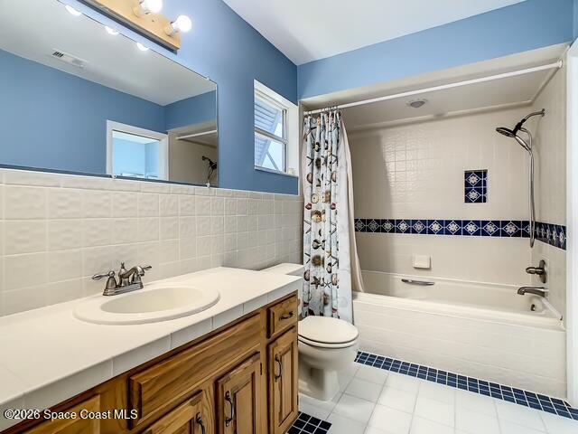 205 Rita Boulevard Melbourne Beach, FL 32951 - Photo 10 of 19 a bathroom with a sink a toilet and a bathtub
