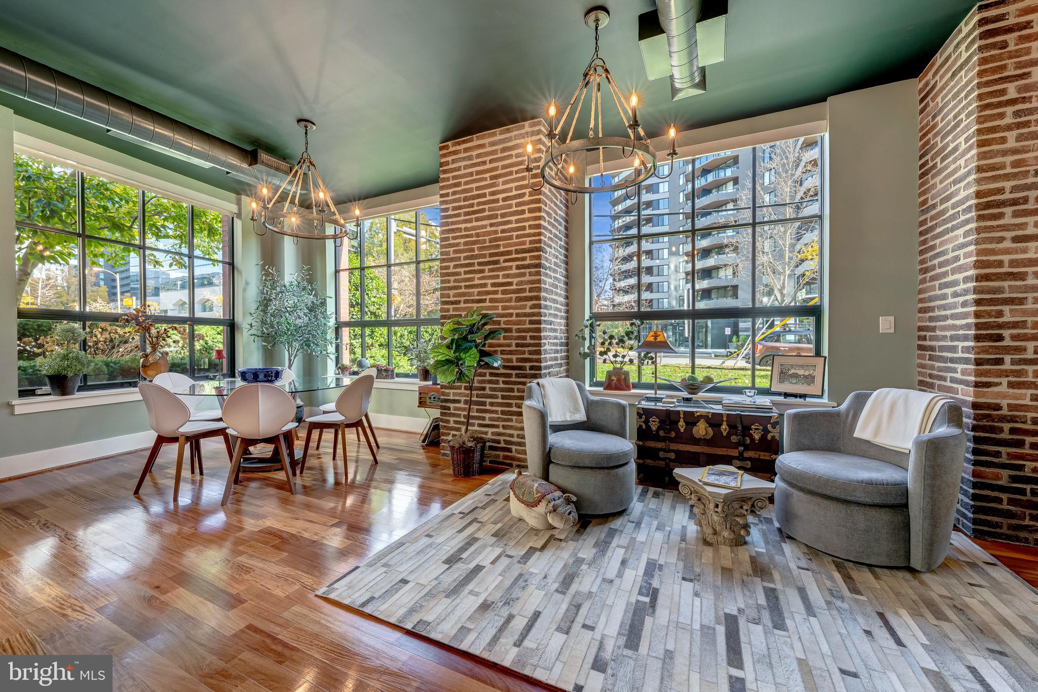 1600 Clarendon Boulevard, Unit W108 Arlington, VA 22209 - Photo 14 of 50 a view of a dining room with furniture window and outside view