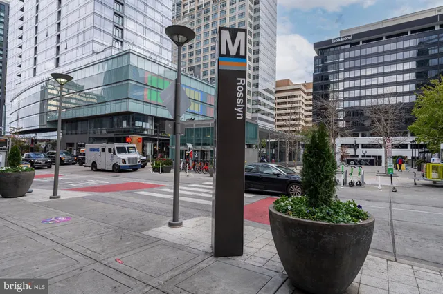 a view of a brick building with many windows