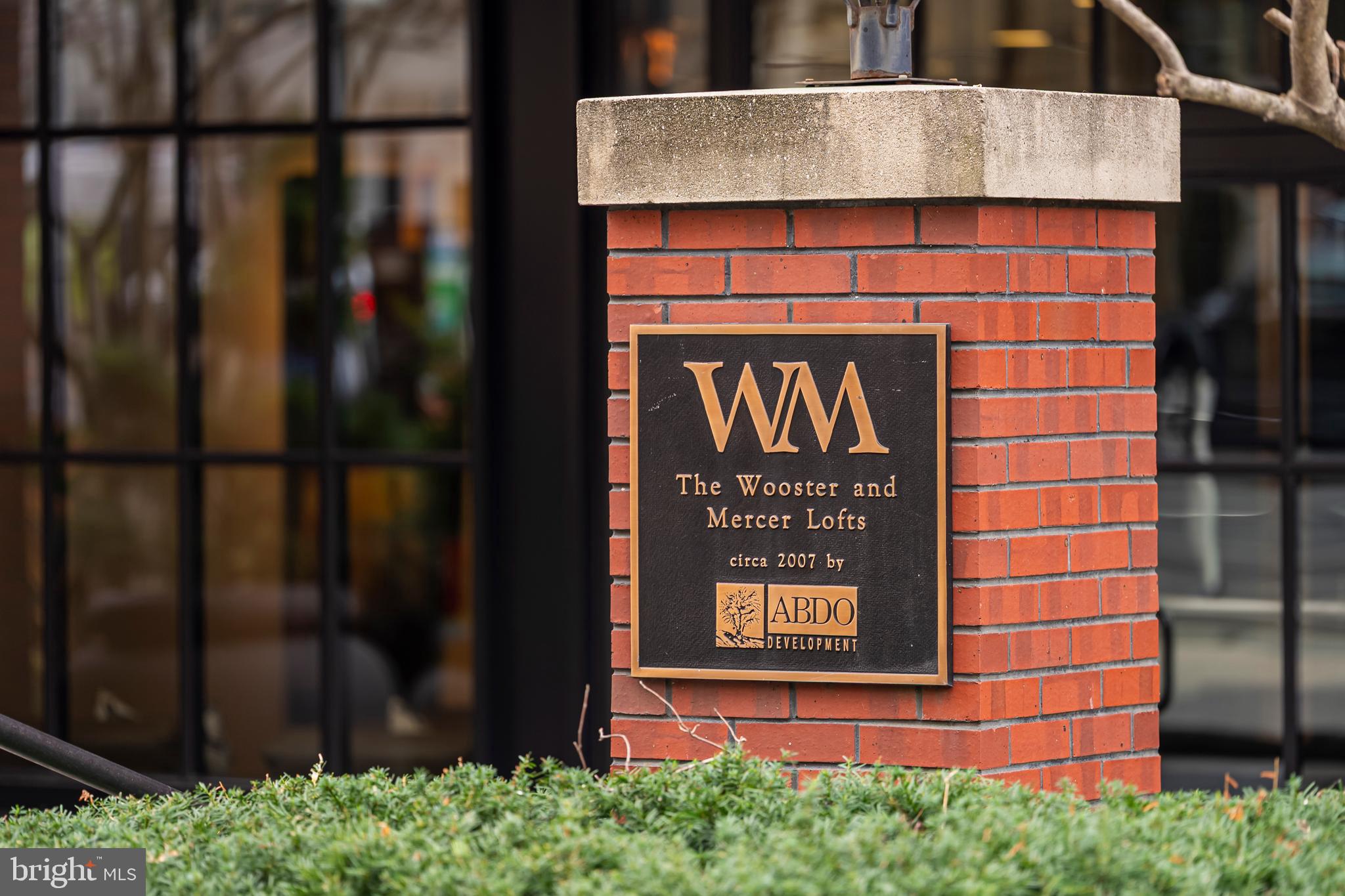 1600 Clarendon Boulevard, Unit W108 Arlington, VA 22209 - Photo 49 of 50 a sign on the side of a building