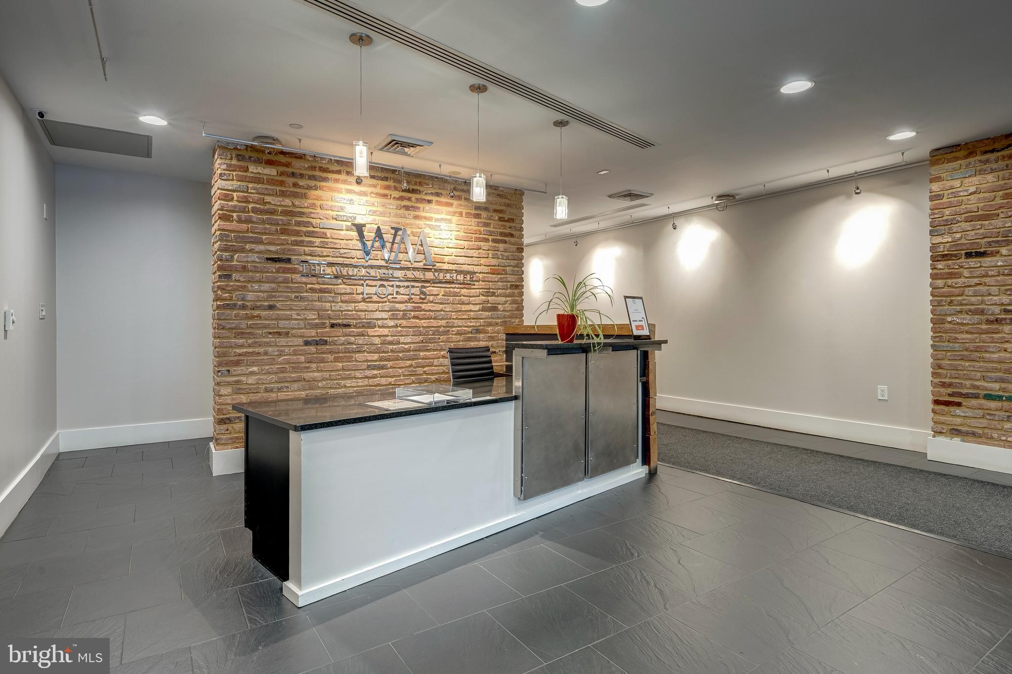 1600 Clarendon Boulevard, Unit W108 Arlington, VA 22209 - Photo 5 of 50 a view of an empty room with wooden floor