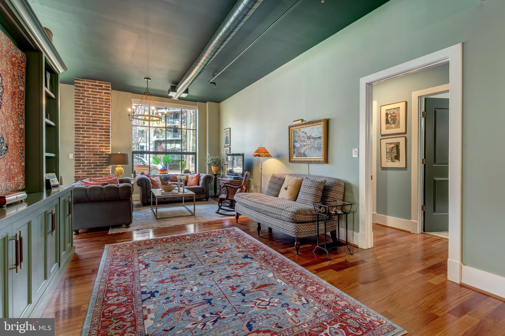 1600 Clarendon Boulevard, Unit W108 Arlington, VA 22209 - Photo 10 of 50 a living room with furniture rug and wooden floor