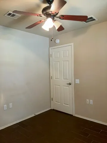 a view of outdoor space with wooden fence