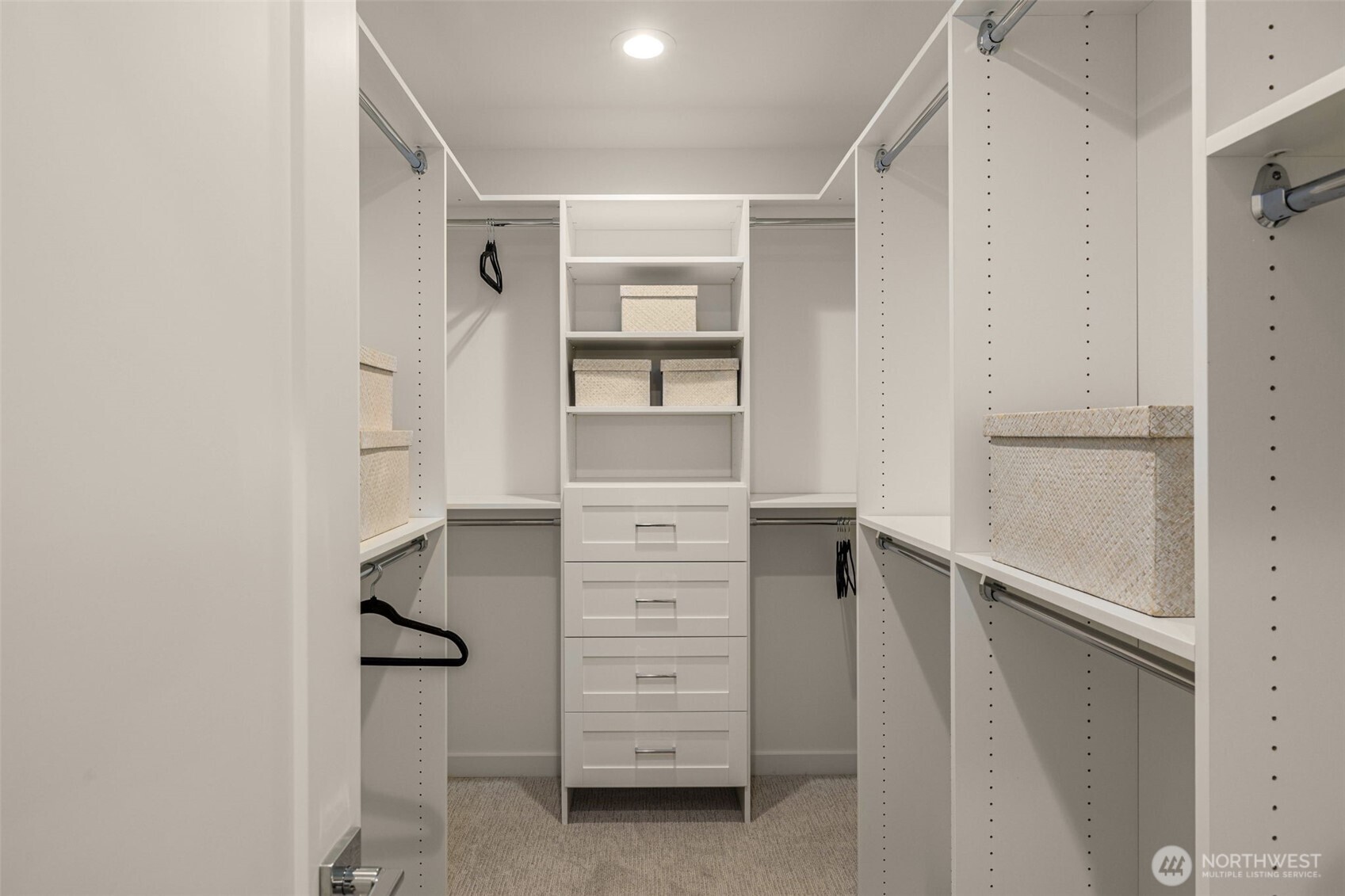 4409 B 21st Avenue Southwest Seattle, WA 98106 - Photo 17 of 23 a view of walk in closet with empty racks