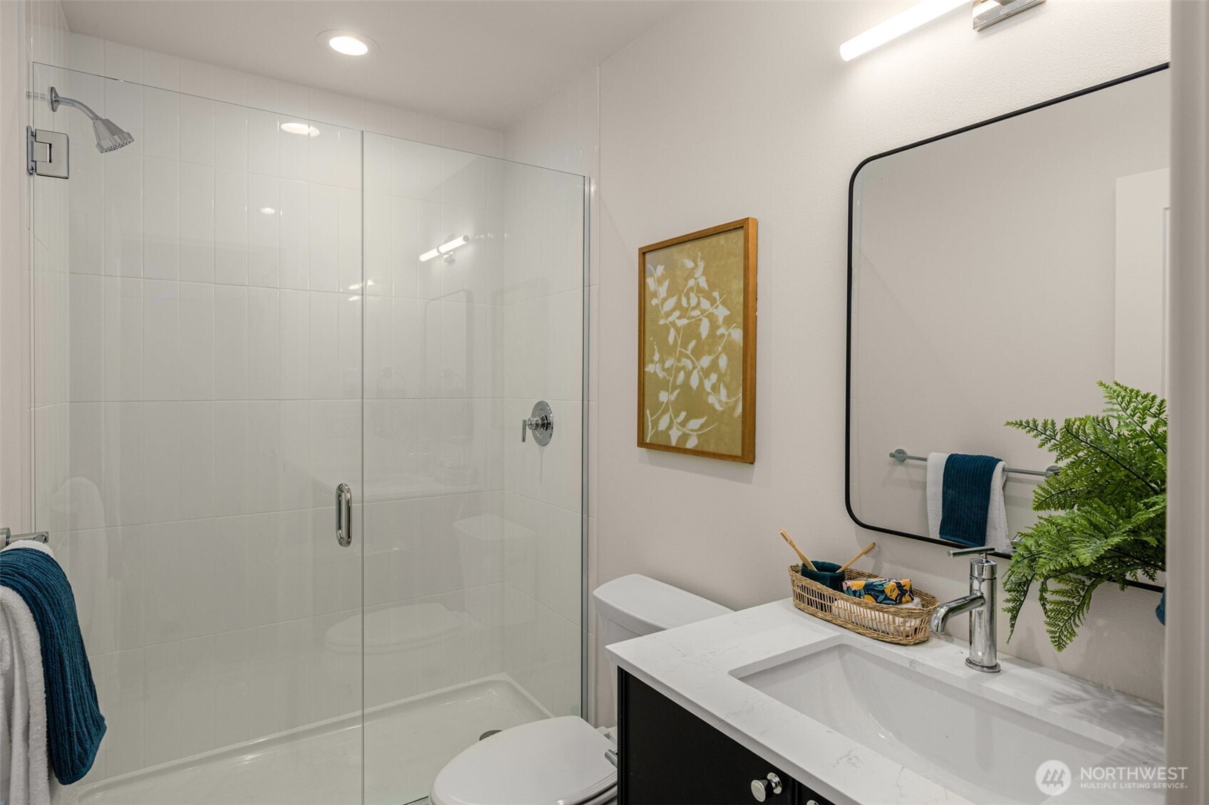 4409 B 21st Avenue Southwest Seattle, WA 98106 - Photo 19 of 23 a bathroom with a sink toilet and shower