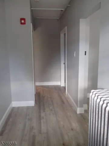 a view of hallway with closet