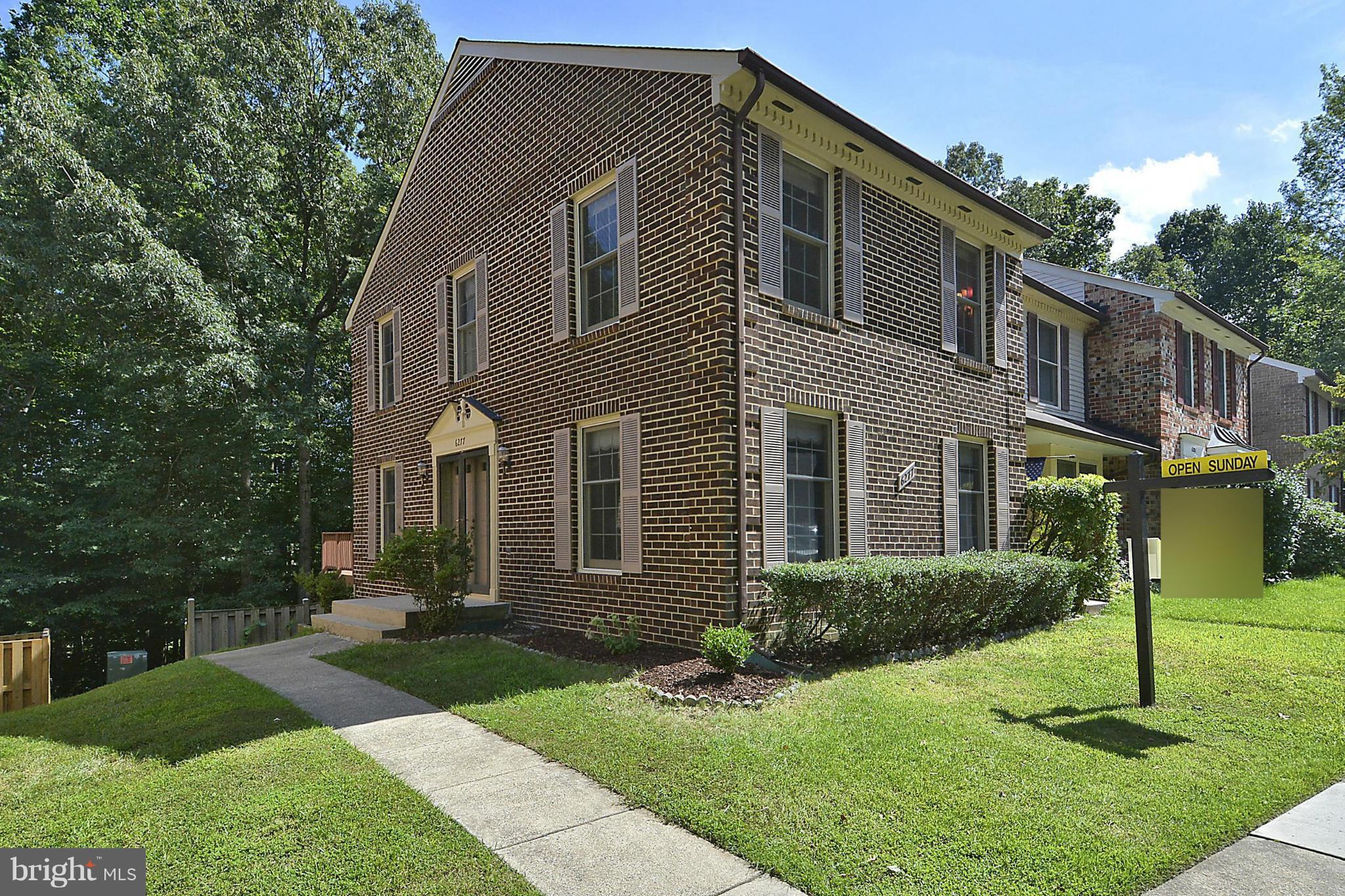 6277 Rathlin Drive Springfield, VA 22152 - Photo 1 of 30 a front view of a house with a yard