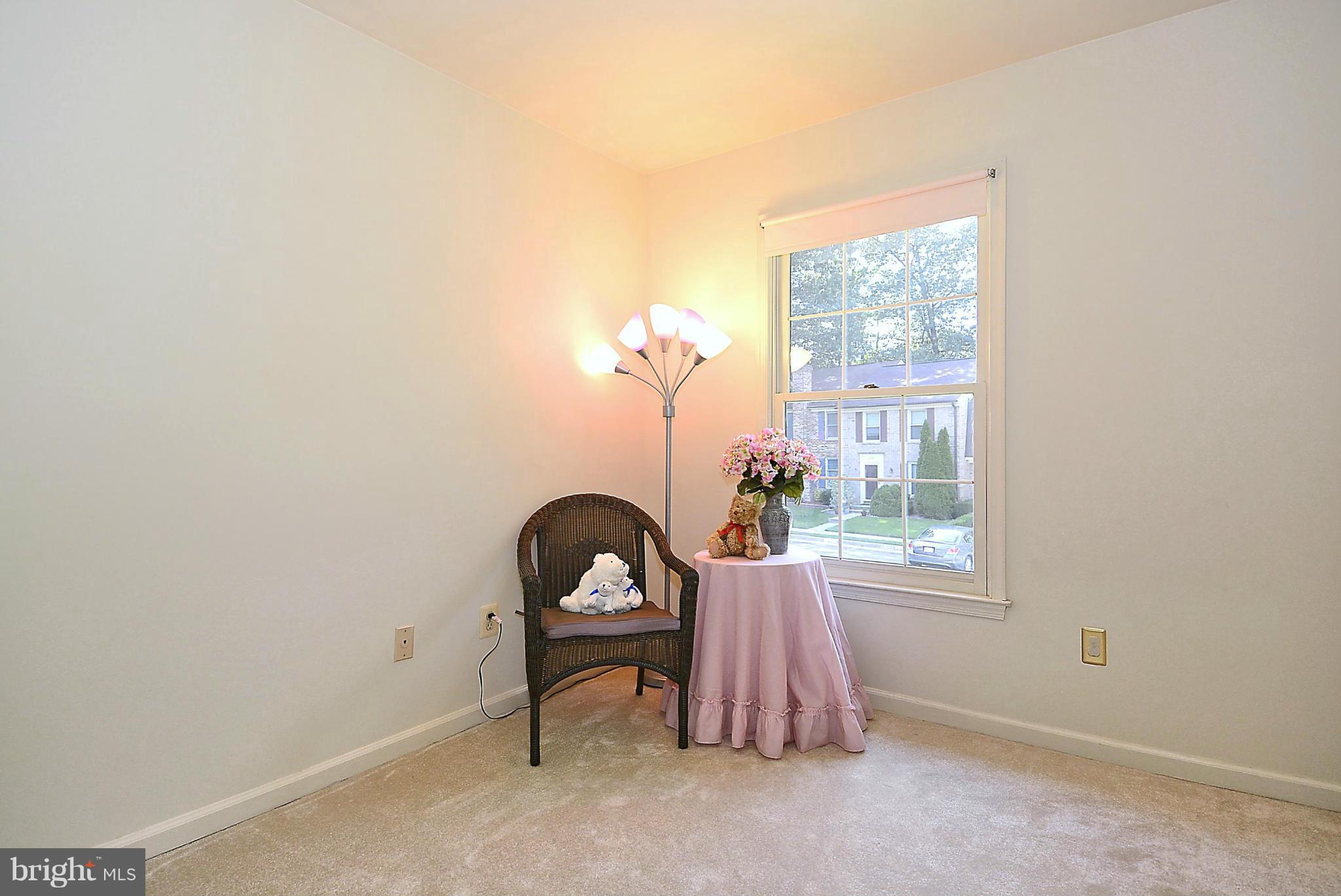 6277 Rathlin Drive Springfield, VA 22152 - Photo 13 of 30 a view of a room that has a bed and a window