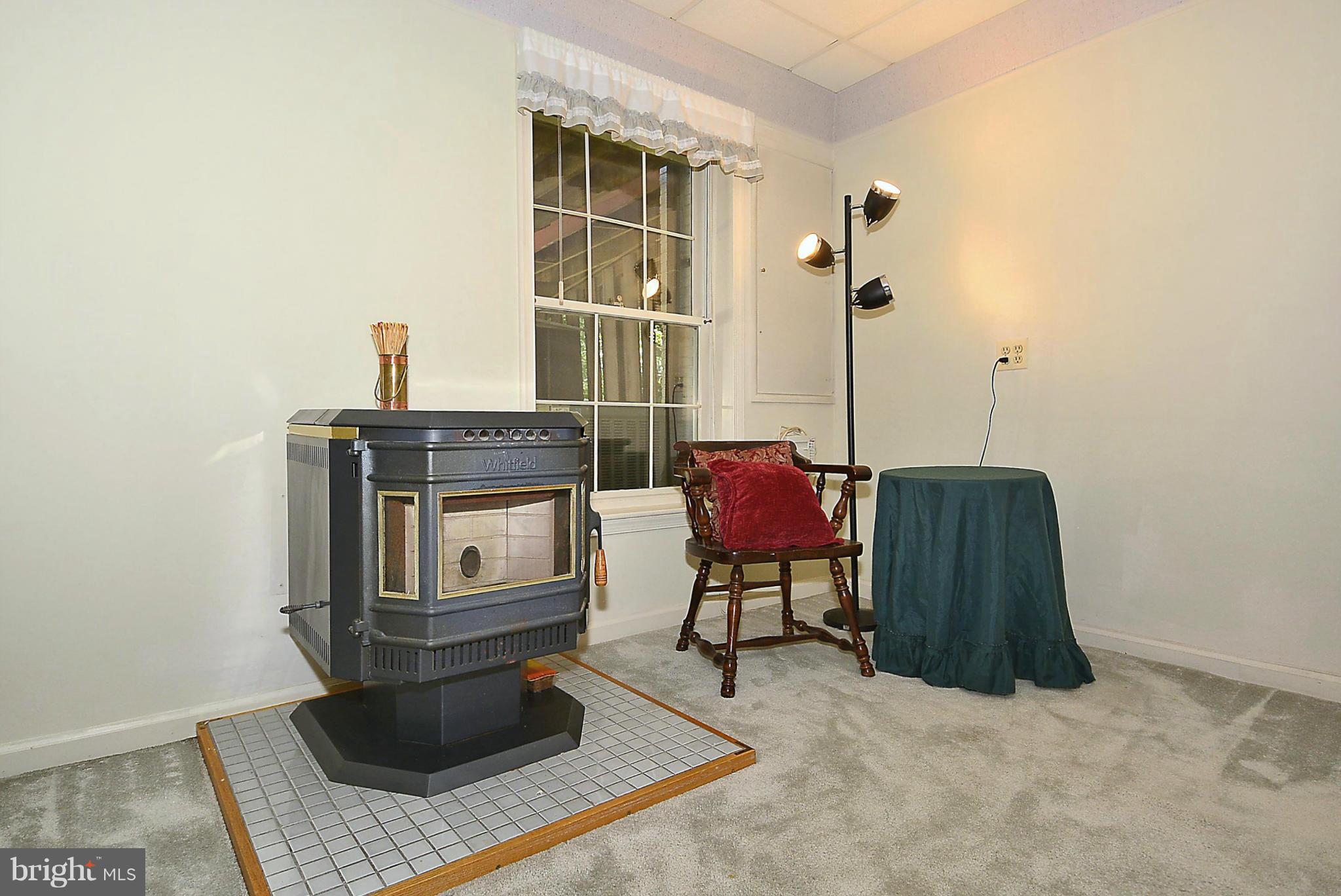 6277 Rathlin Drive Springfield, VA 22152 - Photo 17 of 30 a living room with furniture a flat screen tv and a window