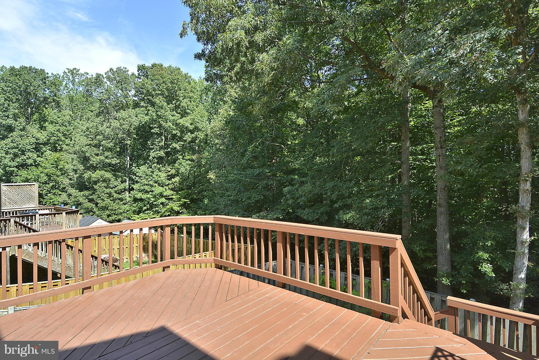 6277 Rathlin Drive Springfield, VA 22152 - Photo 22 of 30 a view of balcony with wooden deck