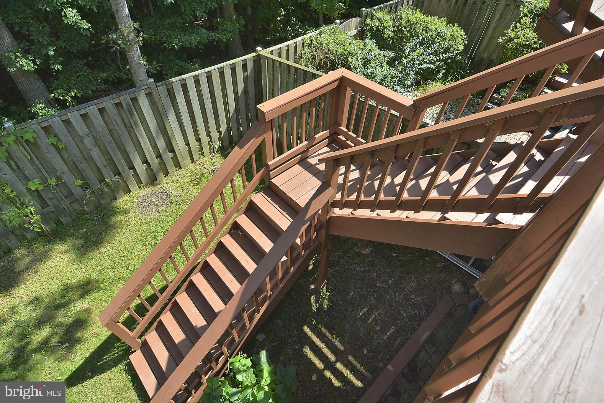 6277 Rathlin Drive Springfield, VA 22152 - Photo 23 of 30 a view of a house with a deck