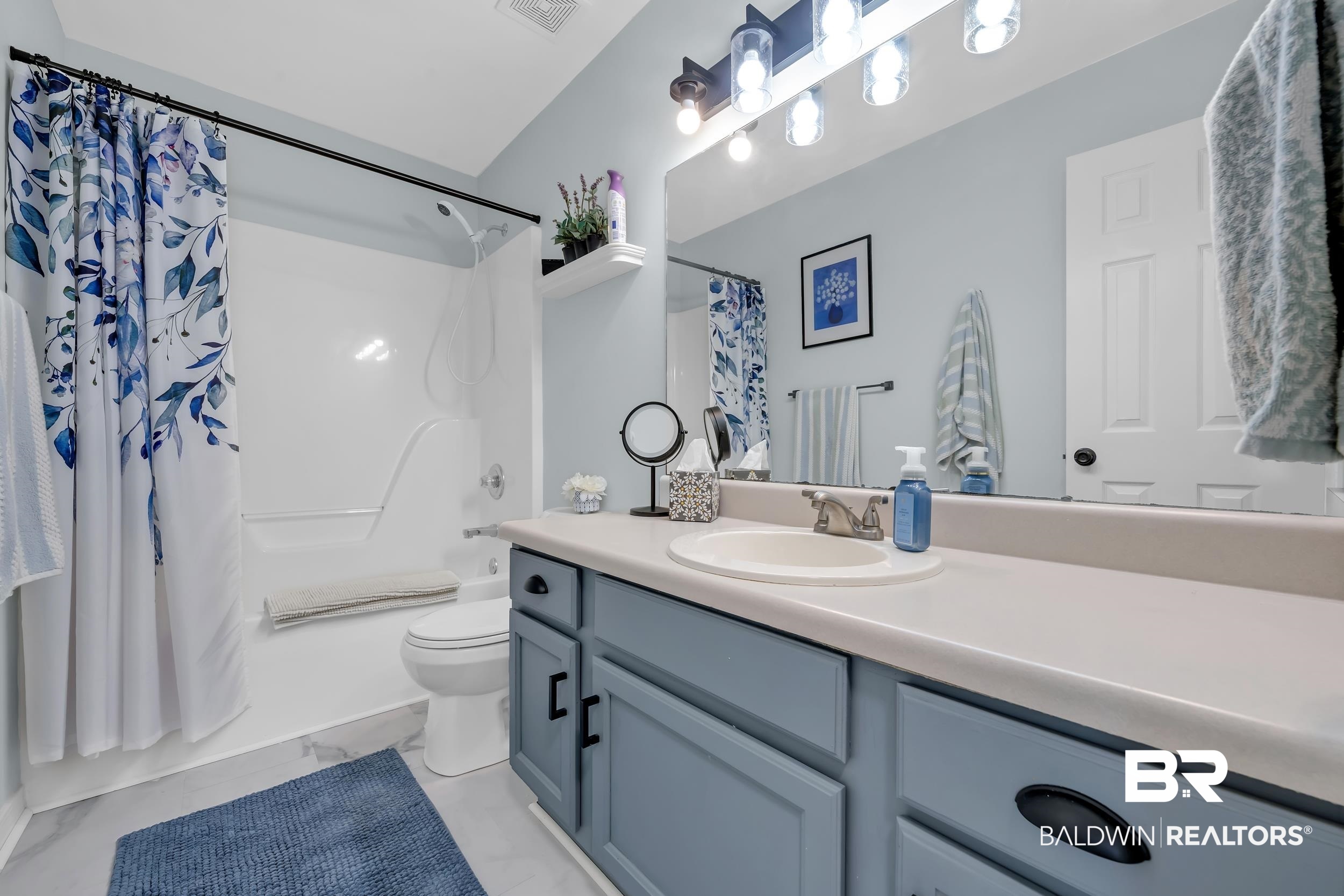 191 Robbins Boulevard Daphne, AL 36526 - Photo 17 of 24 Bathroom with vanity and shower / tub combo