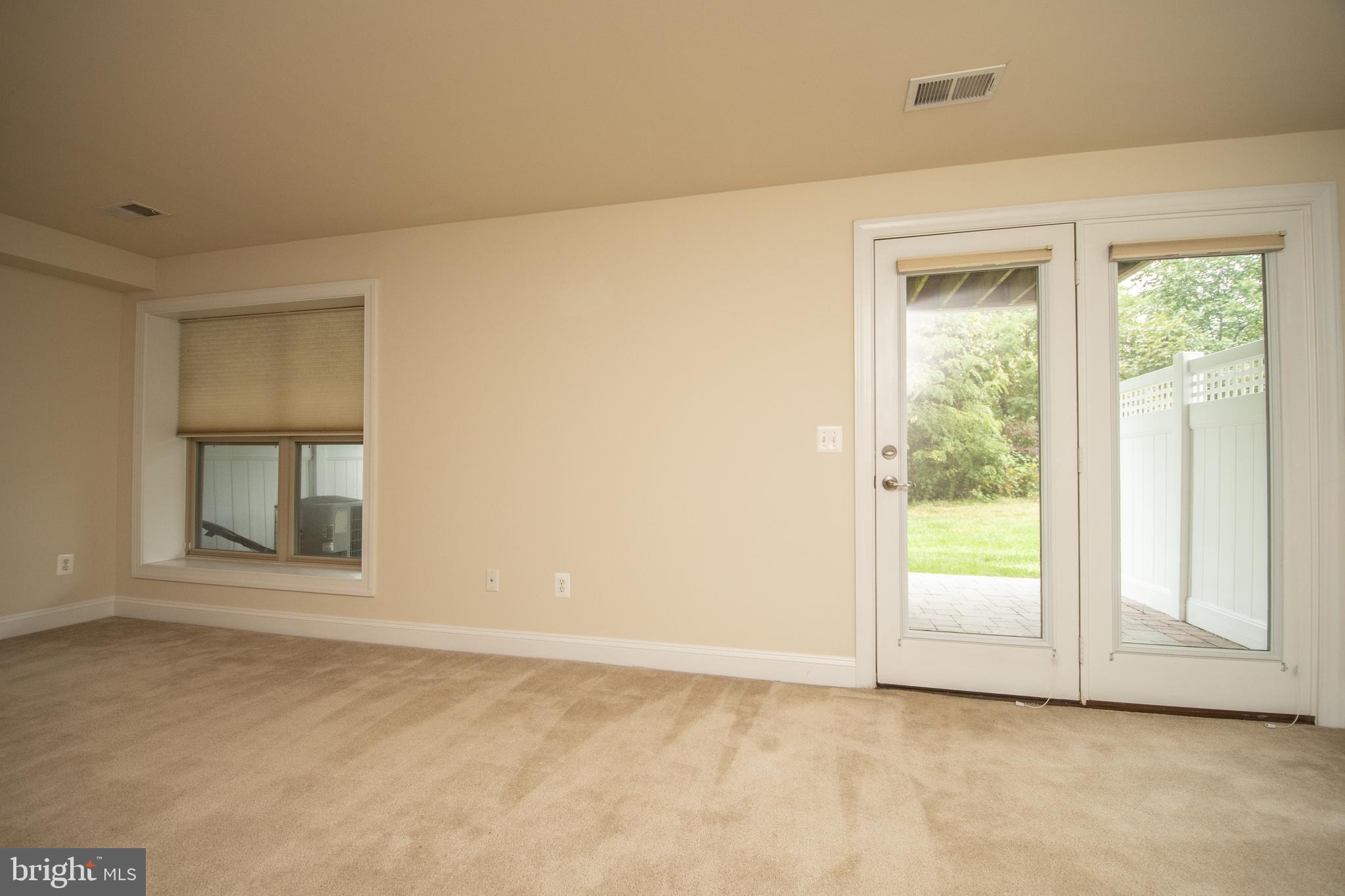 22199 Falling Terrace Ashburn, VA 20148 - Photo 15 of 58 an empty room with windows and closet