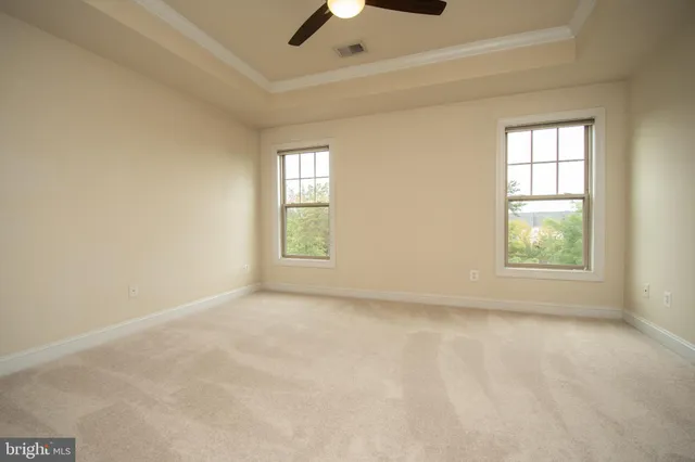 an empty room with closet area