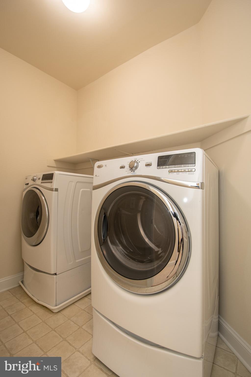 22199 Falling Terrace Ashburn, VA 20148 - Photo 48 of 58 a utility room with dryer and washer