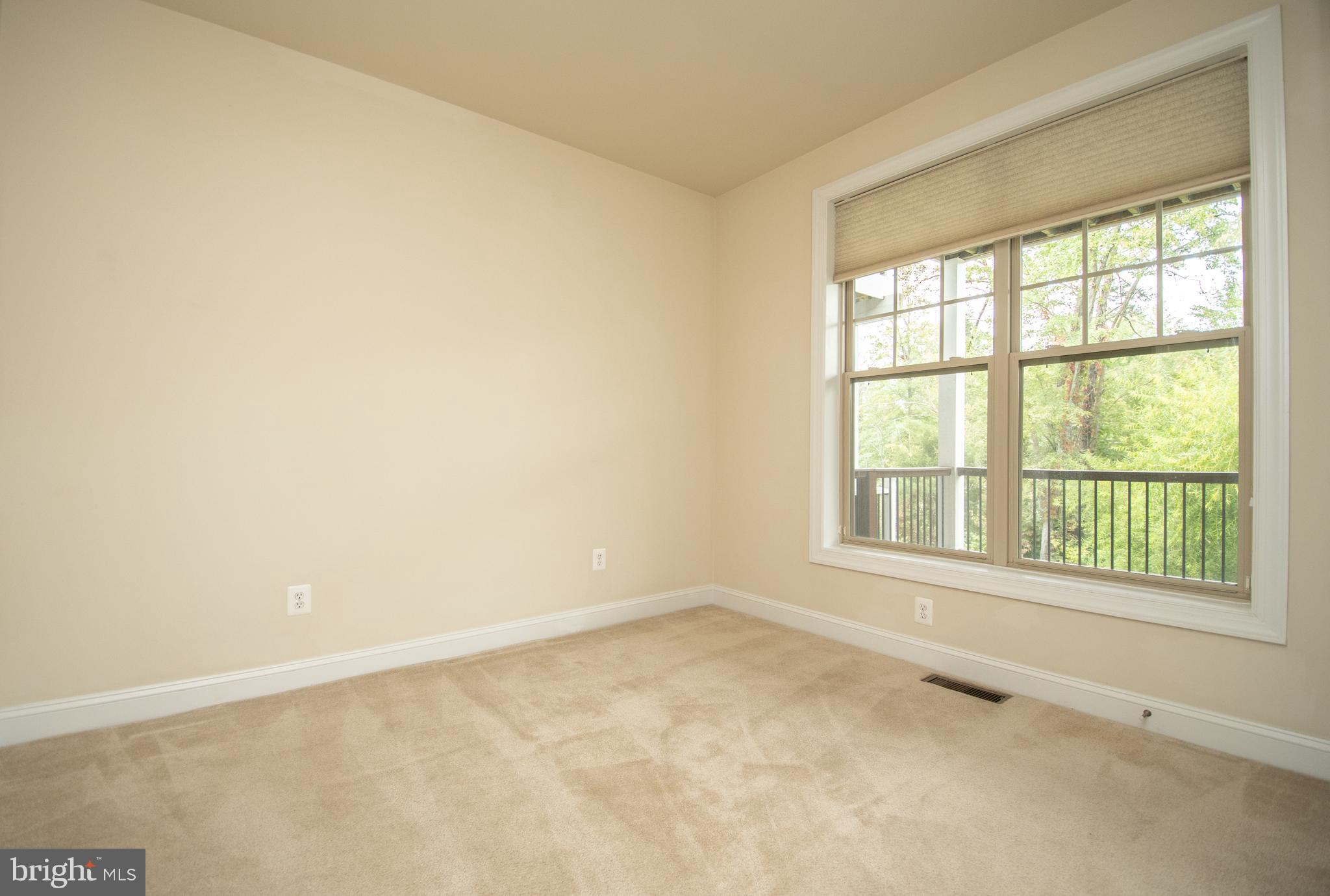 22199 Falling Terrace Ashburn, VA 20148 - Photo 8 of 58 an empty room with a window