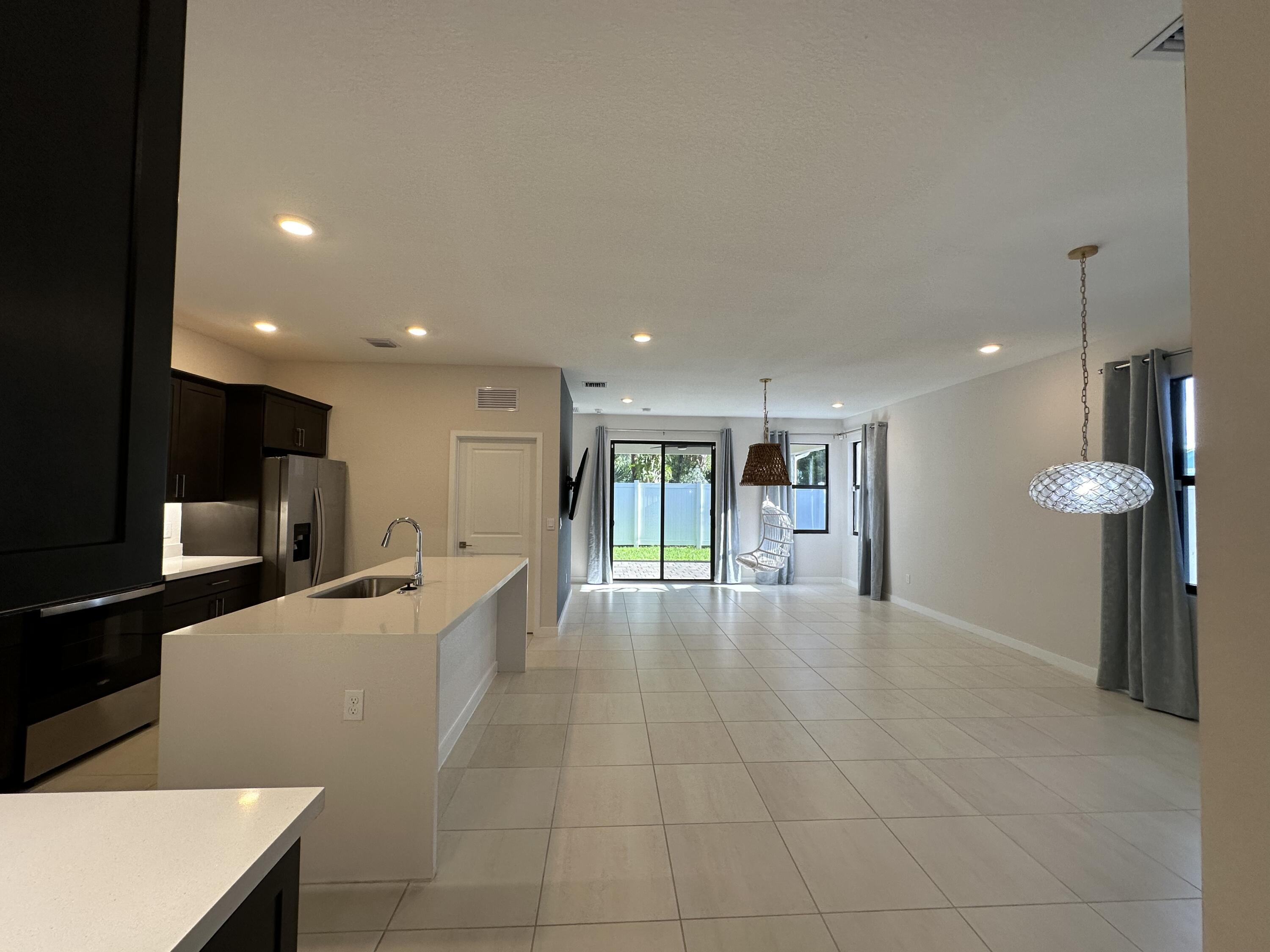 7078 Rockwood Road Jupiter, FL 33458 - Photo 3 of 18 .