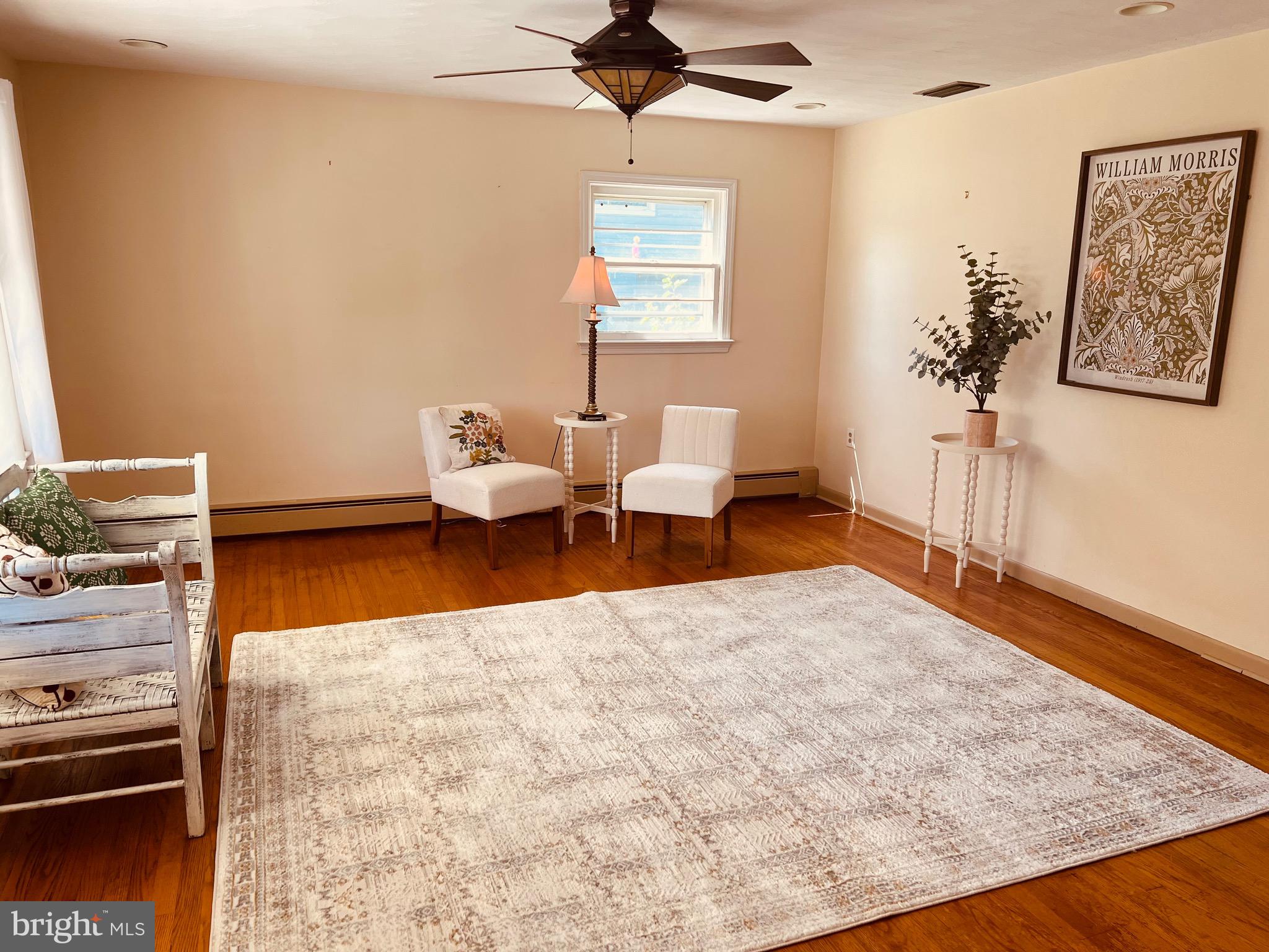 425 Beechcroft Road Winchester, VA 22601 - Photo 3 of 21 a bedroom with furniture and wooden floor