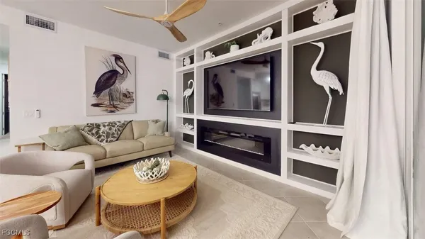 a view of a patio with a table and chairs