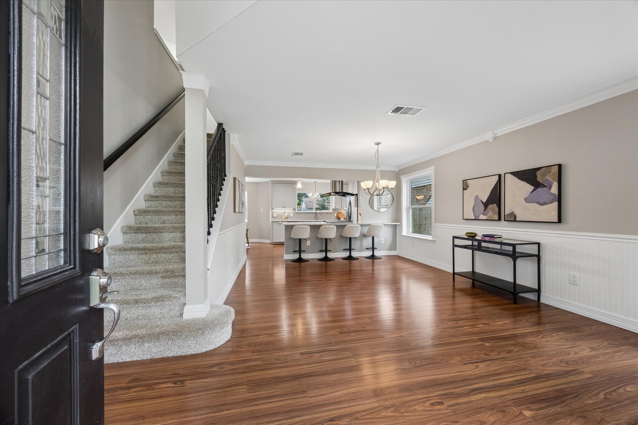 1306 Shady Grove Path Cedar Park, TX 78613 - Photo 3 of 40 a living room with furniture and a wooden floor