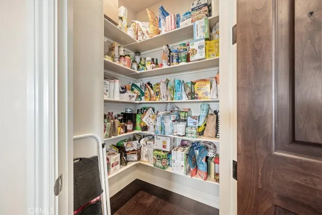 a dining room with shelves