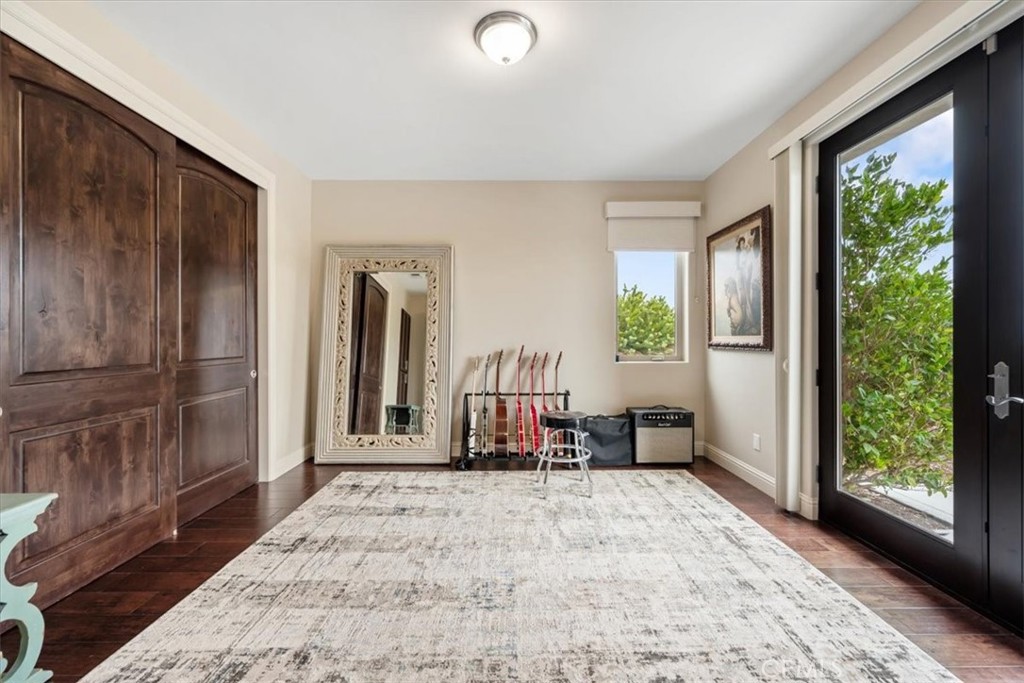 207 Princessa Lane Pismo Beach, CA 93449 - Photo 27 of 38 a bedroom with furniture and large window