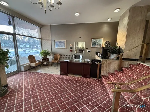 a living room with a couch and a table