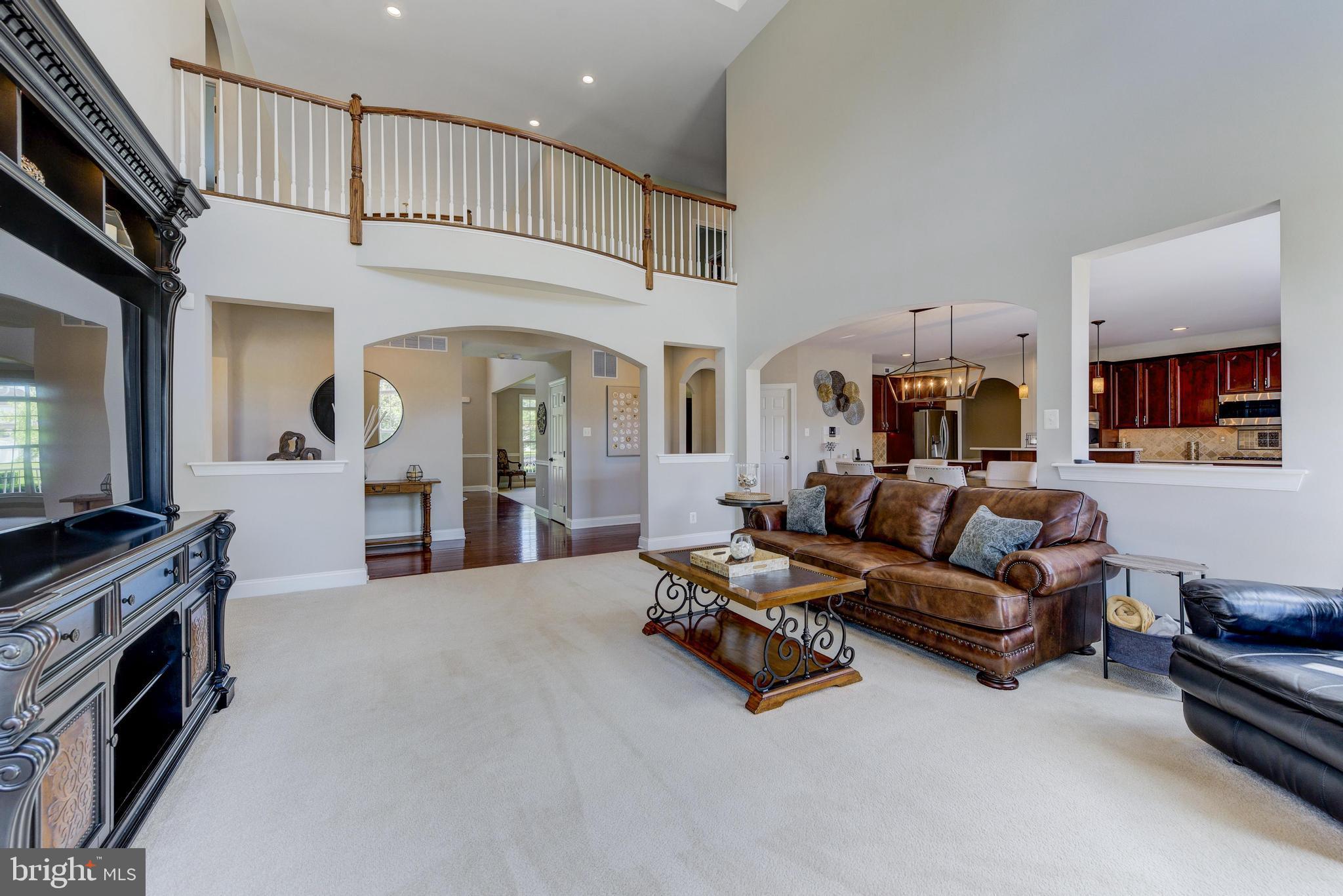 811 Castleton Drive Mickleton, NJ 08056 - Photo 13 of 52 a living room with furniture and a flat screen tv