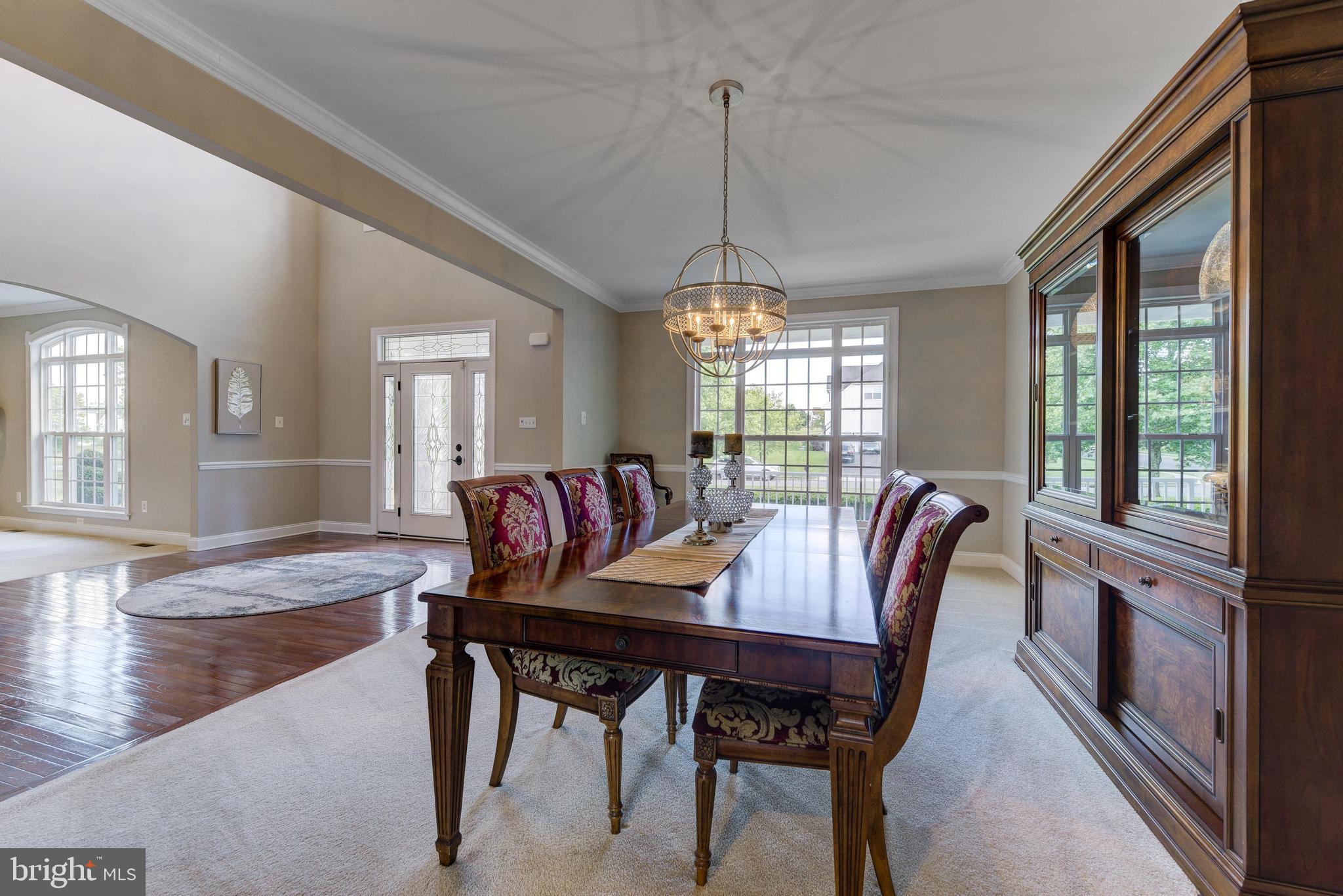 811 Castleton Drive Mickleton, NJ 08056 - Photo 21 of 52 a view of a dining room with furniture window and wooden floor