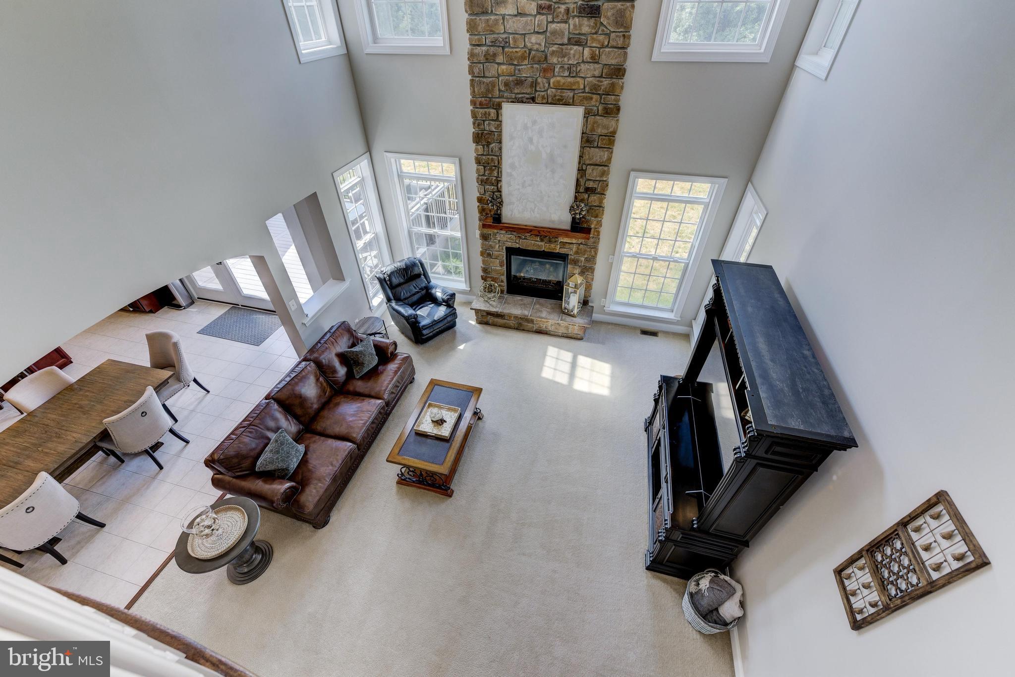 811 Castleton Drive Mickleton, NJ 08056 - Photo 25 of 52 a living room with furniture and a fireplace