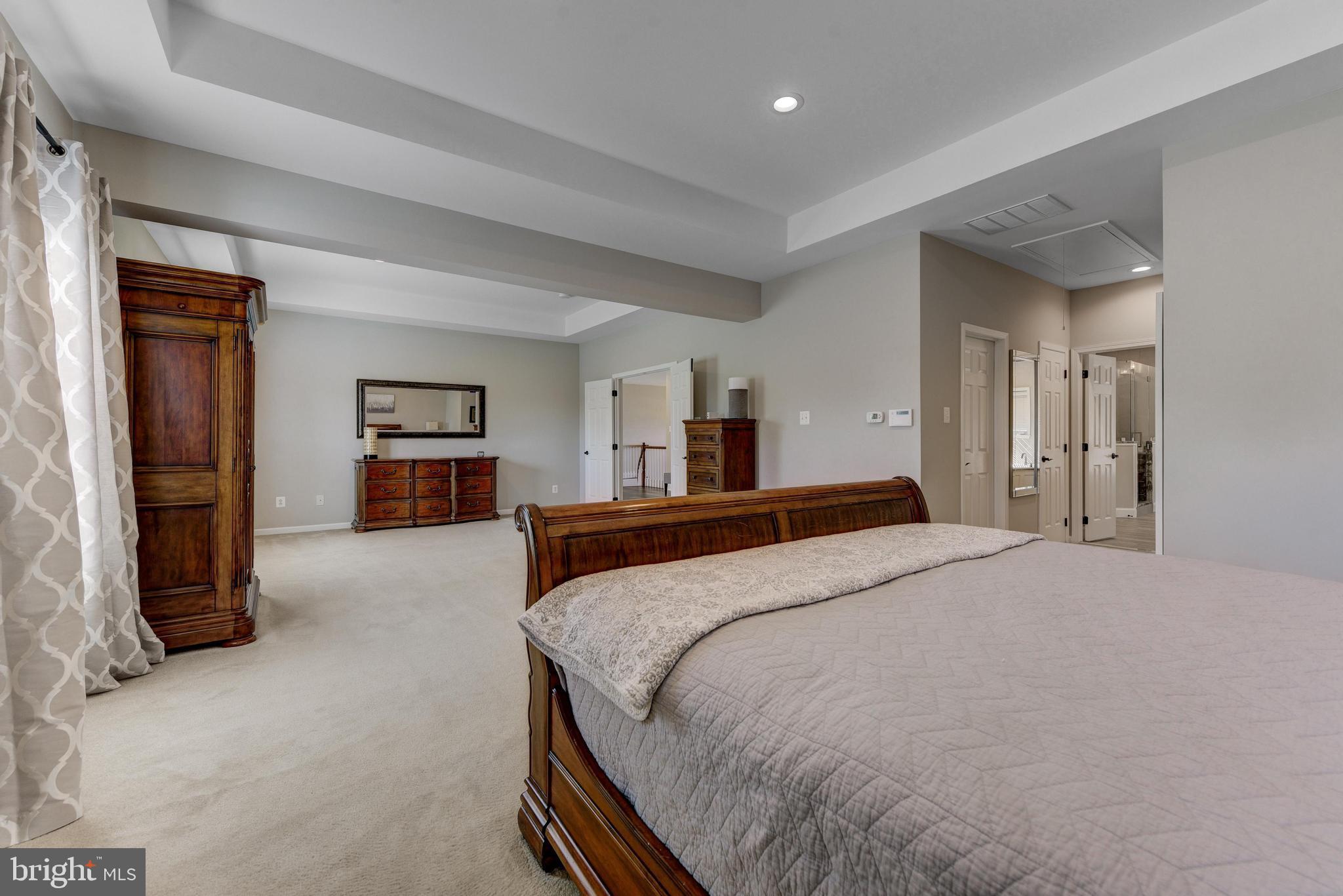811 Castleton Drive Mickleton, NJ 08056 - Photo 28 of 52 a bed room with a bed and a book shelf