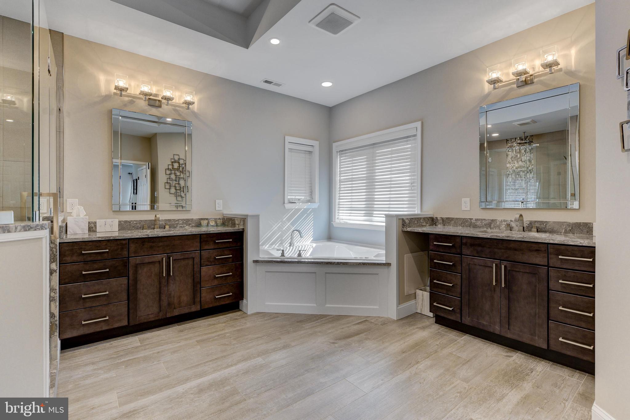 811 Castleton Drive Mickleton, NJ 08056 - Photo 30 of 52 a bathroom with a granite countertop double vanity sink and a mirror