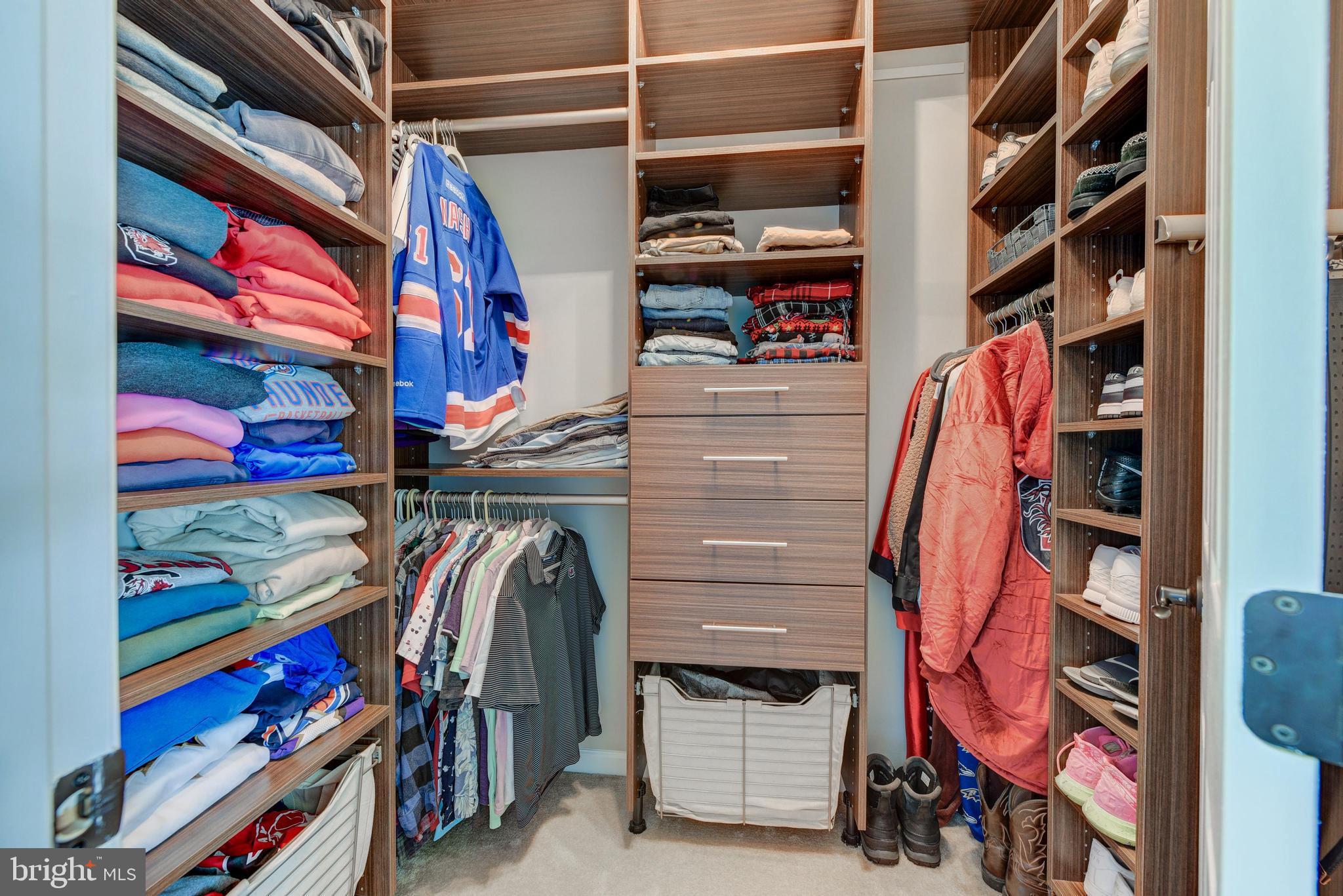 811 Castleton Drive Mickleton, NJ 08056 - Photo 34 of 52 a view of walk in closet with clothes and shoes
