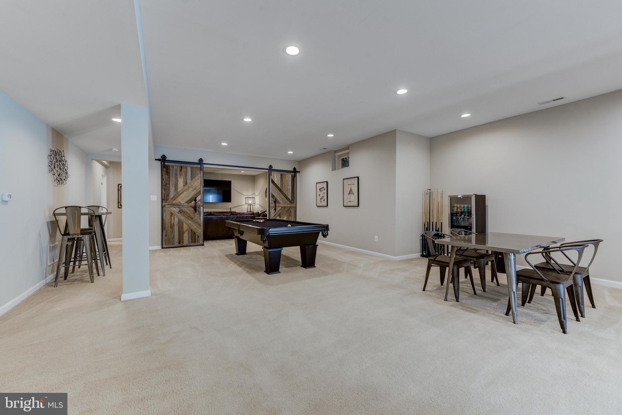 811 Castleton Drive Mickleton, NJ 08056 - Photo 38 of 52 a living room with furniture and a table