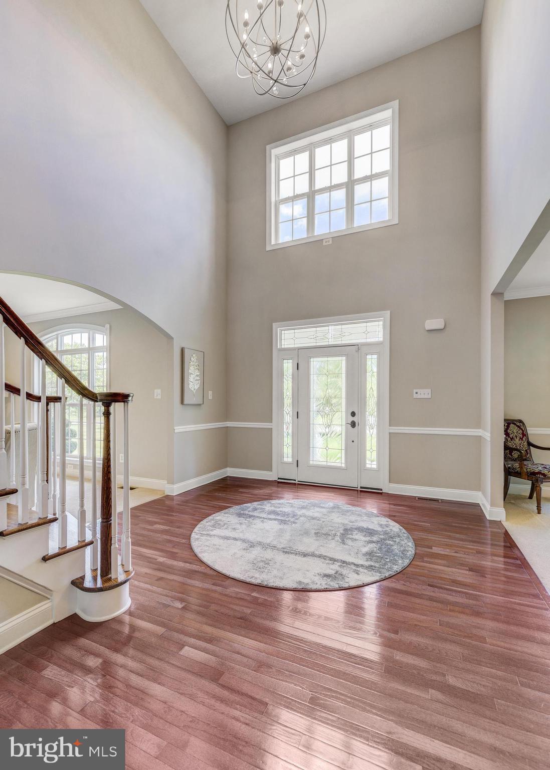 811 Castleton Drive Mickleton, NJ 08056 - Photo 4 of 52 a view of empty room with wooden floor and fan