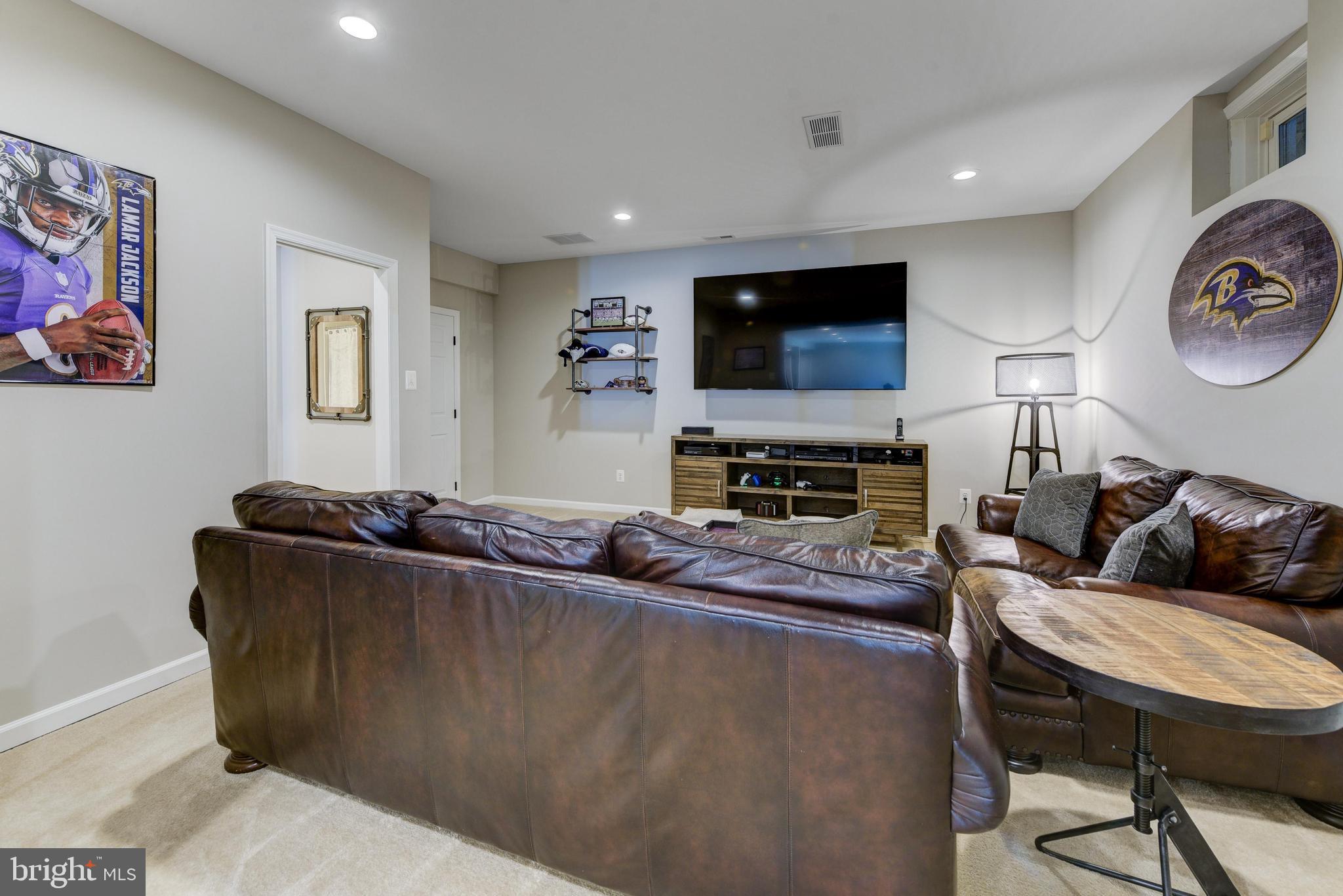 811 Castleton Drive Mickleton, NJ 08056 - Photo 42 of 52 a living room with furniture and a flat screen tv