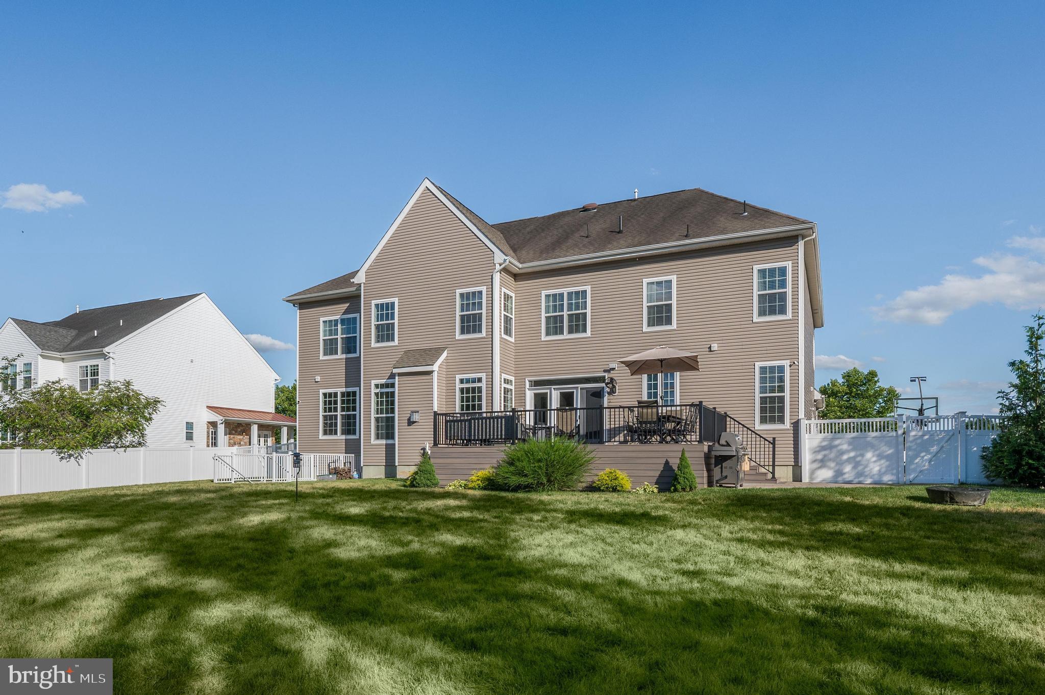 811 Castleton Drive Mickleton, NJ 08056 - Photo 46 of 52 a front view of house with yard and green space