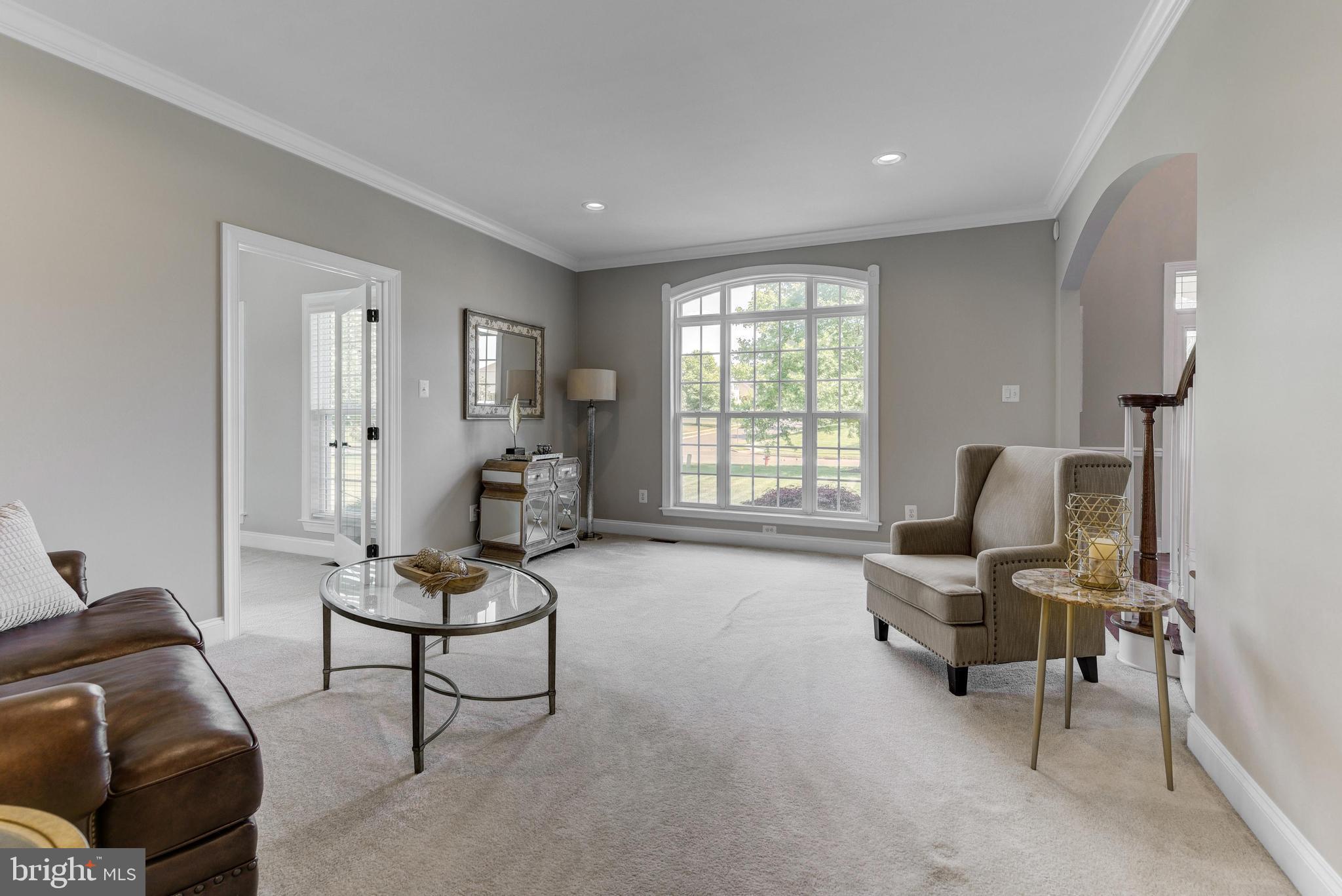 811 Castleton Drive Mickleton, NJ 08056 - Photo 6 of 52 a living room with furniture and a window