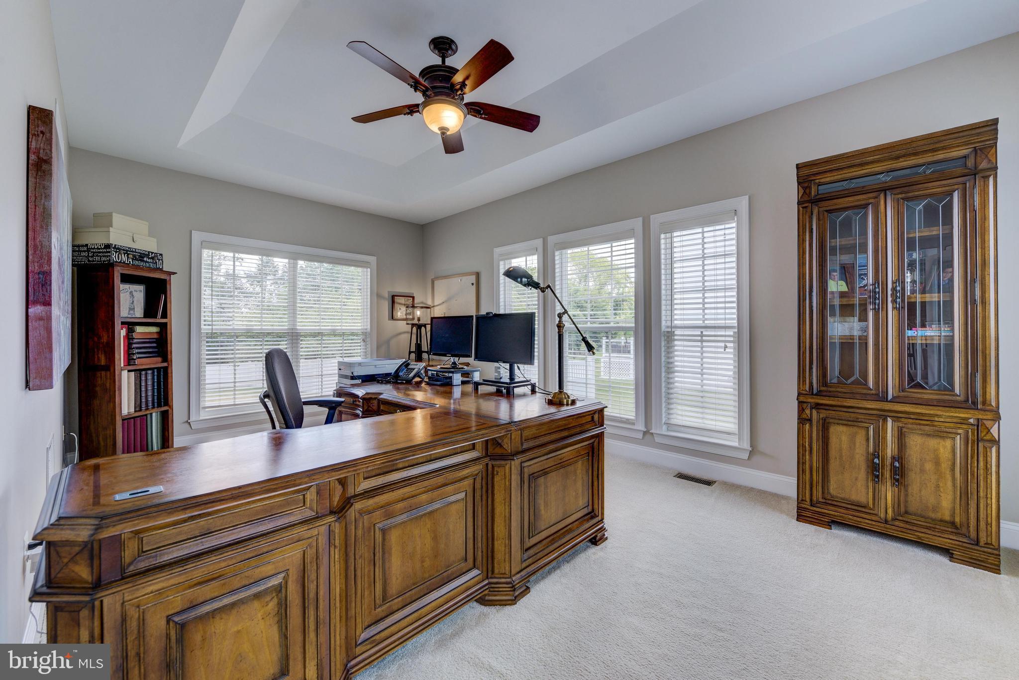 811 Castleton Drive Mickleton, NJ 08056 - Photo 7 of 52 a view of a workspace with furniture and a window