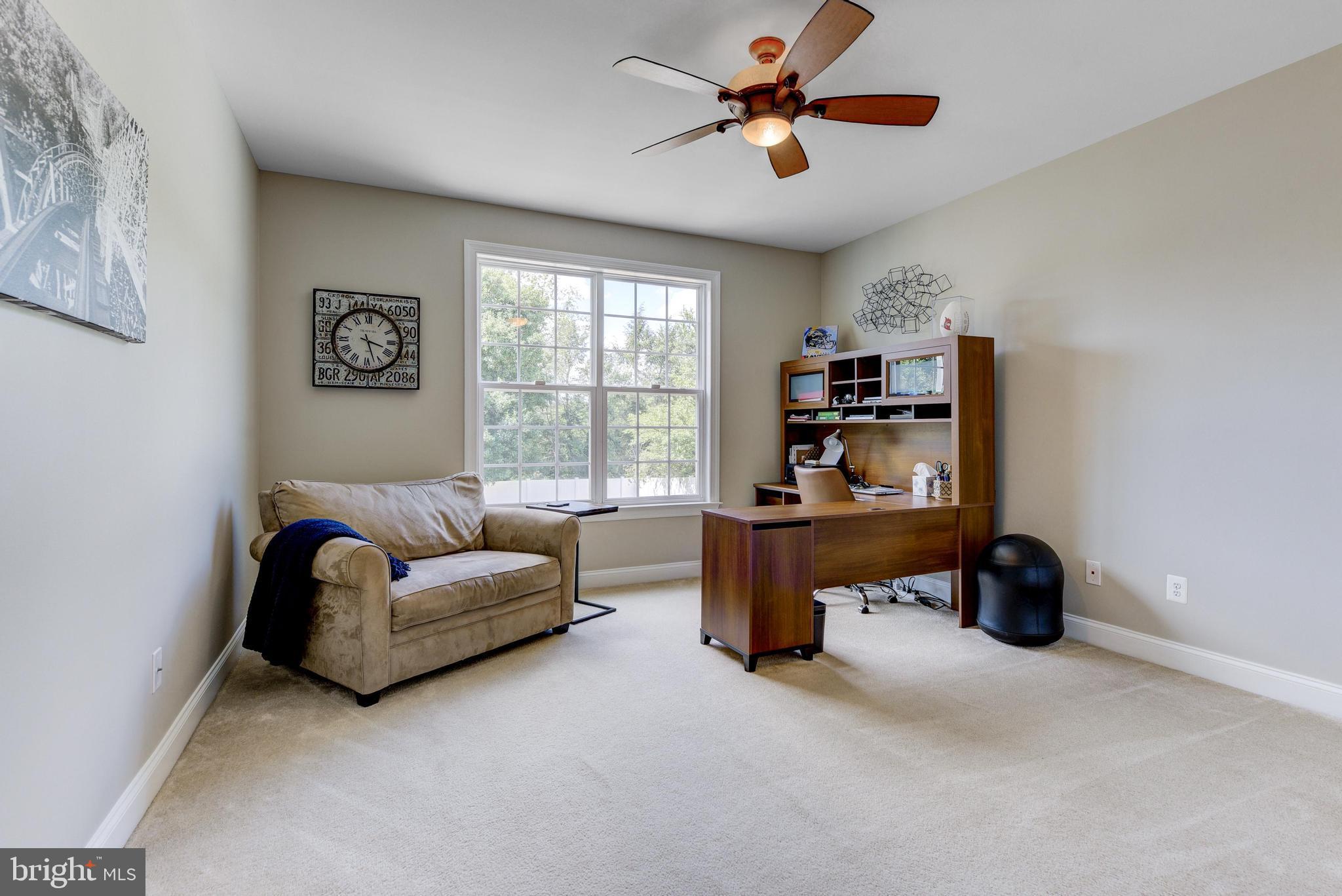 811 Castleton Drive Mickleton, NJ 08056 - Photo 8 of 52 a living room with furniture and a window