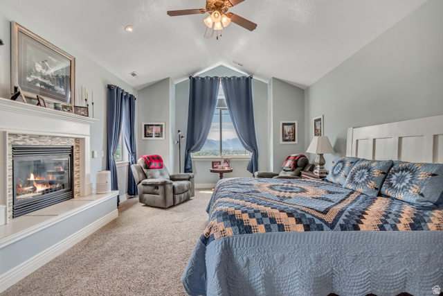 2543 East 700 South Springville, UT 84663 - Photo 44 of 73 Carpeted bedroom with a tile fireplace and a ceiling fan