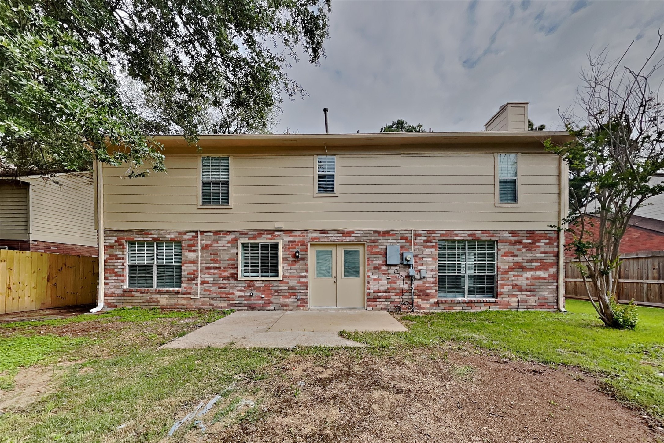 16303 Hickory Point Road Houston, TX 77095 - Photo 19 of 21 a view of a house with a yard