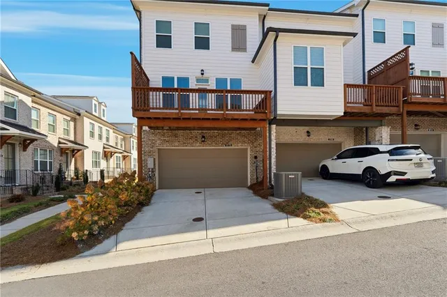 a view of a car park in front of a building