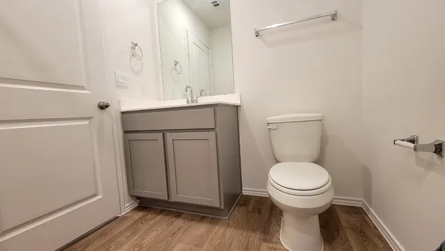 a bathroom with a sink and a toilet