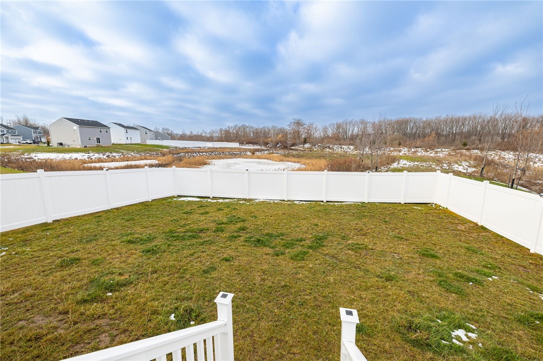 259 Nevins Road Henrietta, NY 14467 - Photo 19 of 21 NEW vinyl fence in backyard