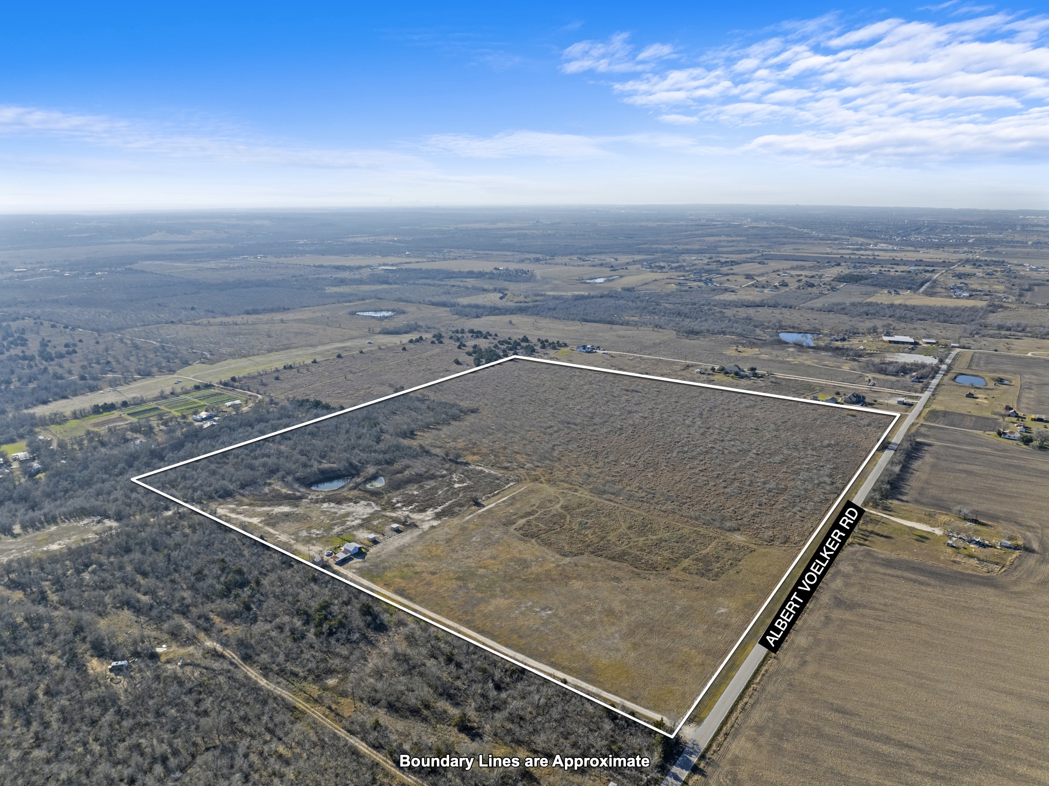 17501 Albert Voelker Road Elgin, TX 78621 - Photo 2 of 11 a view of an ocean