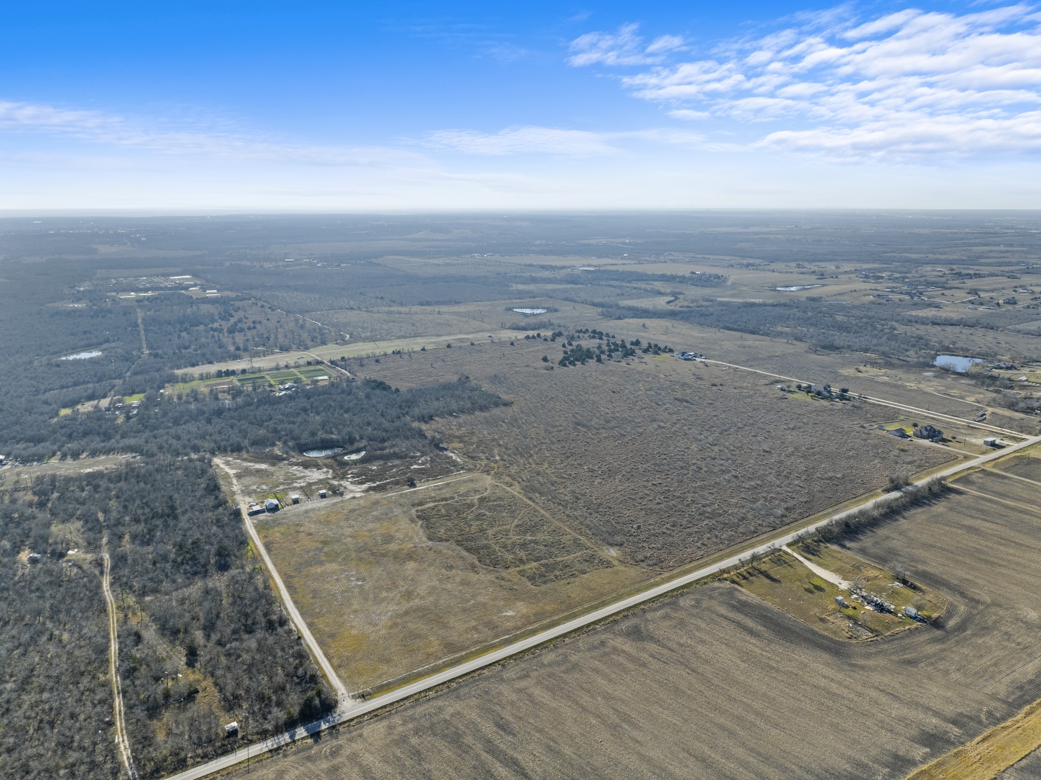 17501 Albert Voelker Road Elgin, TX 78621 - Photo 6 of 11 an aerial view of beach and ocean